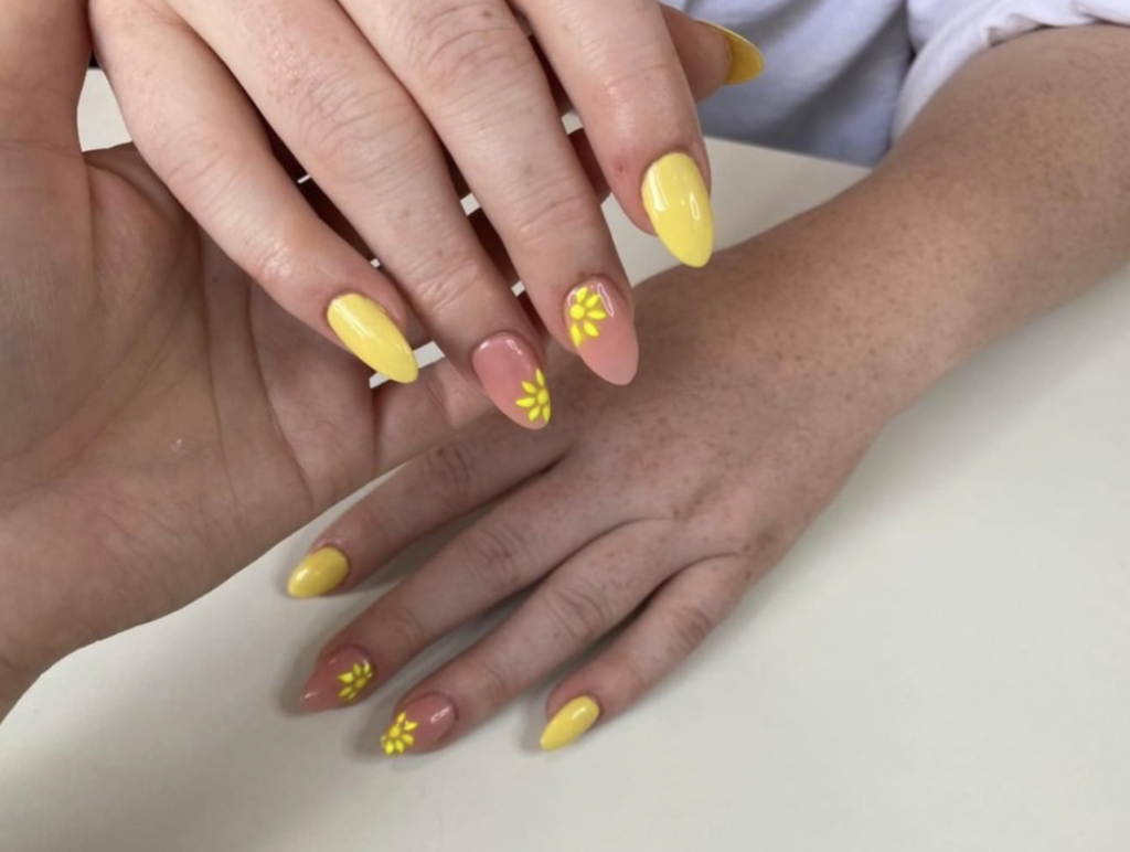 Pink and yellow nails done at our Peterborough salon