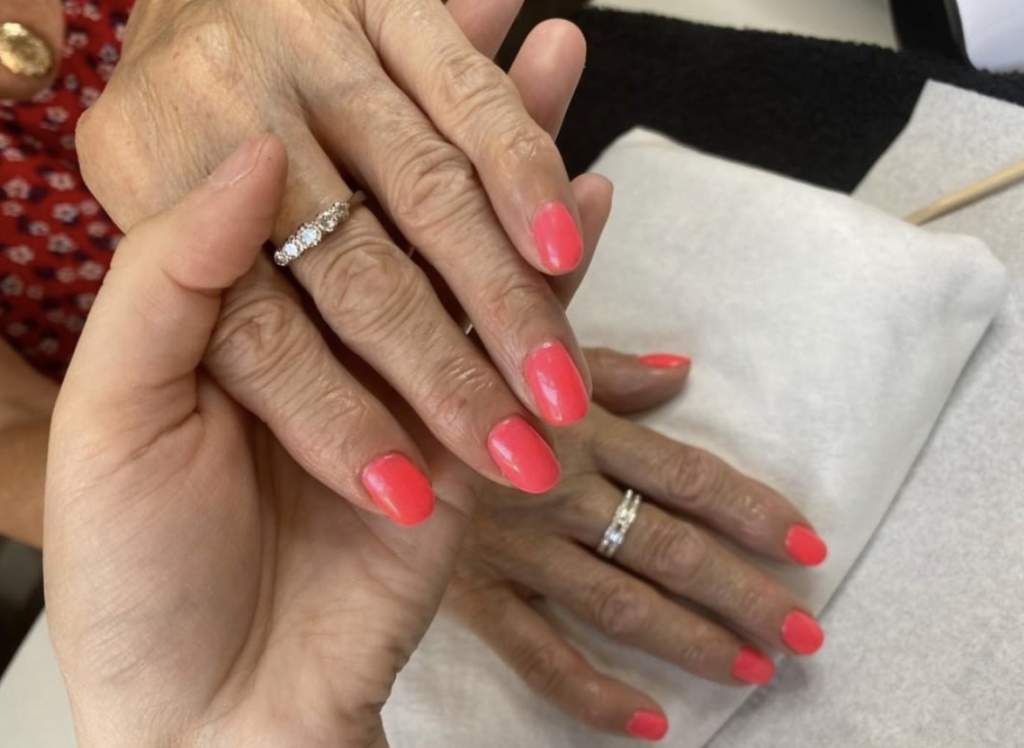 Bright pink manicure done at our Peterborough salon