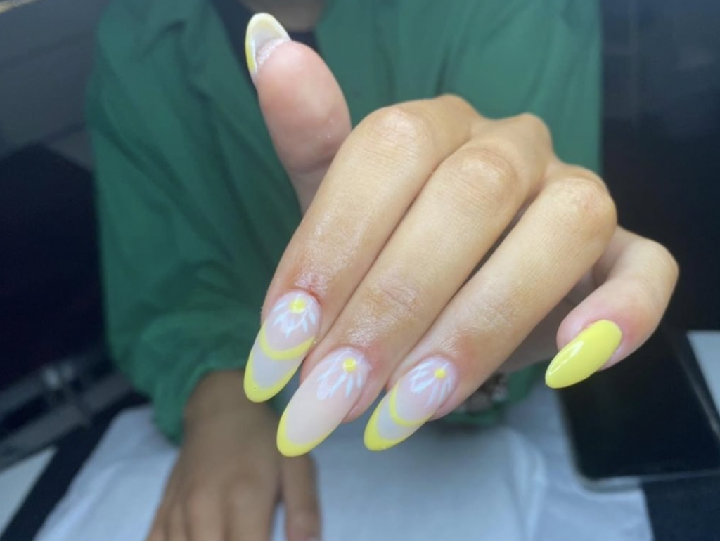 Yellow acrylic nails done at our Peterborough salon
